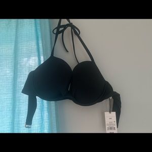 Brand new bikini top, halter style. 32d. Just doesn’t quite fit me